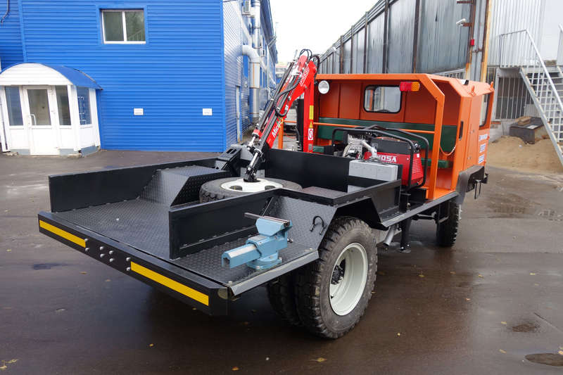 Транспортное грузопассажирское средство для шахт и рудников КРОТ Т32224 с грузоподъемным модулем